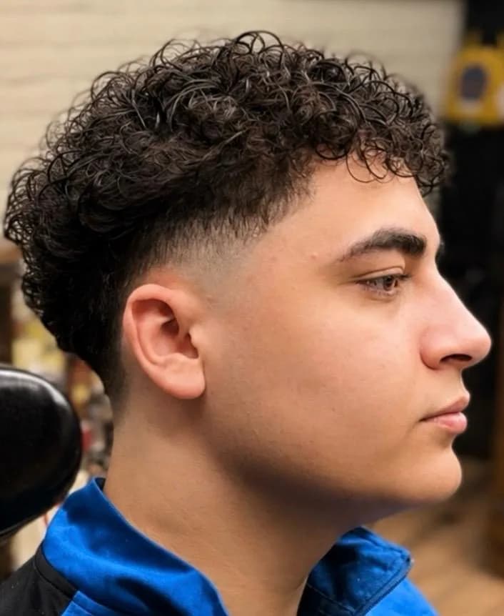 Moderne getextureerde crop met fade bij Barbershop De Maten in Apeldoorn